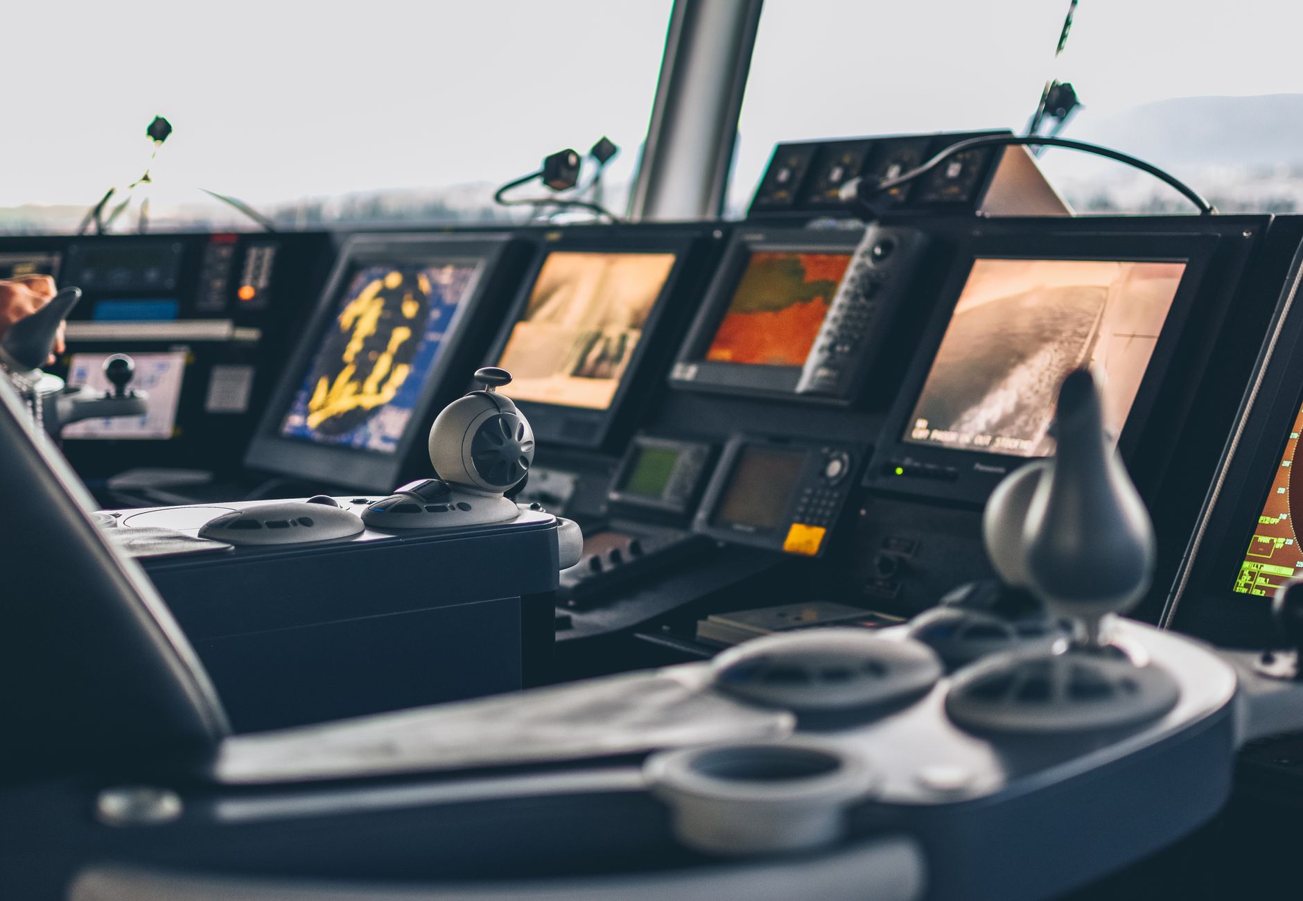 High-tech nautical cockpit showcasing advanced navigation systems and controls.